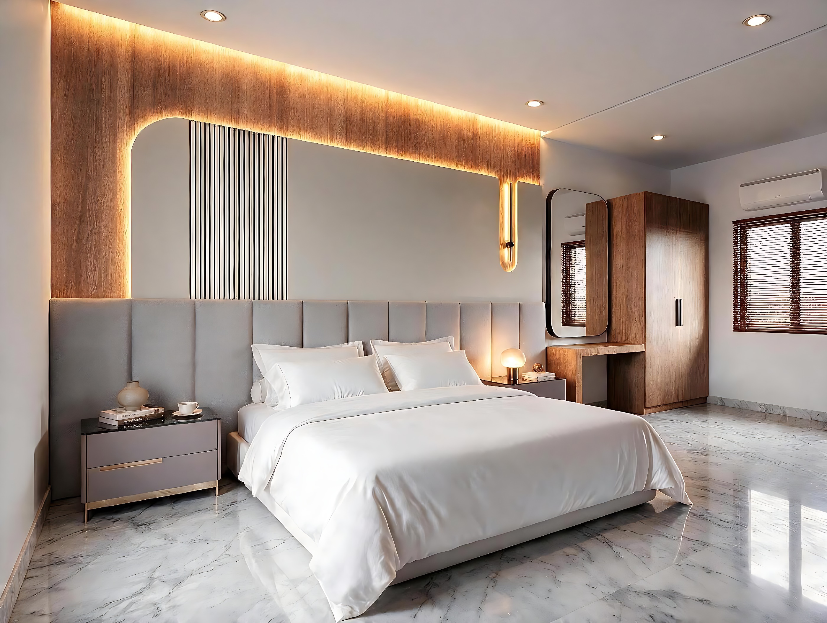 Suite at RK Sathyam Grand with a backlit timber headboard and marble floor